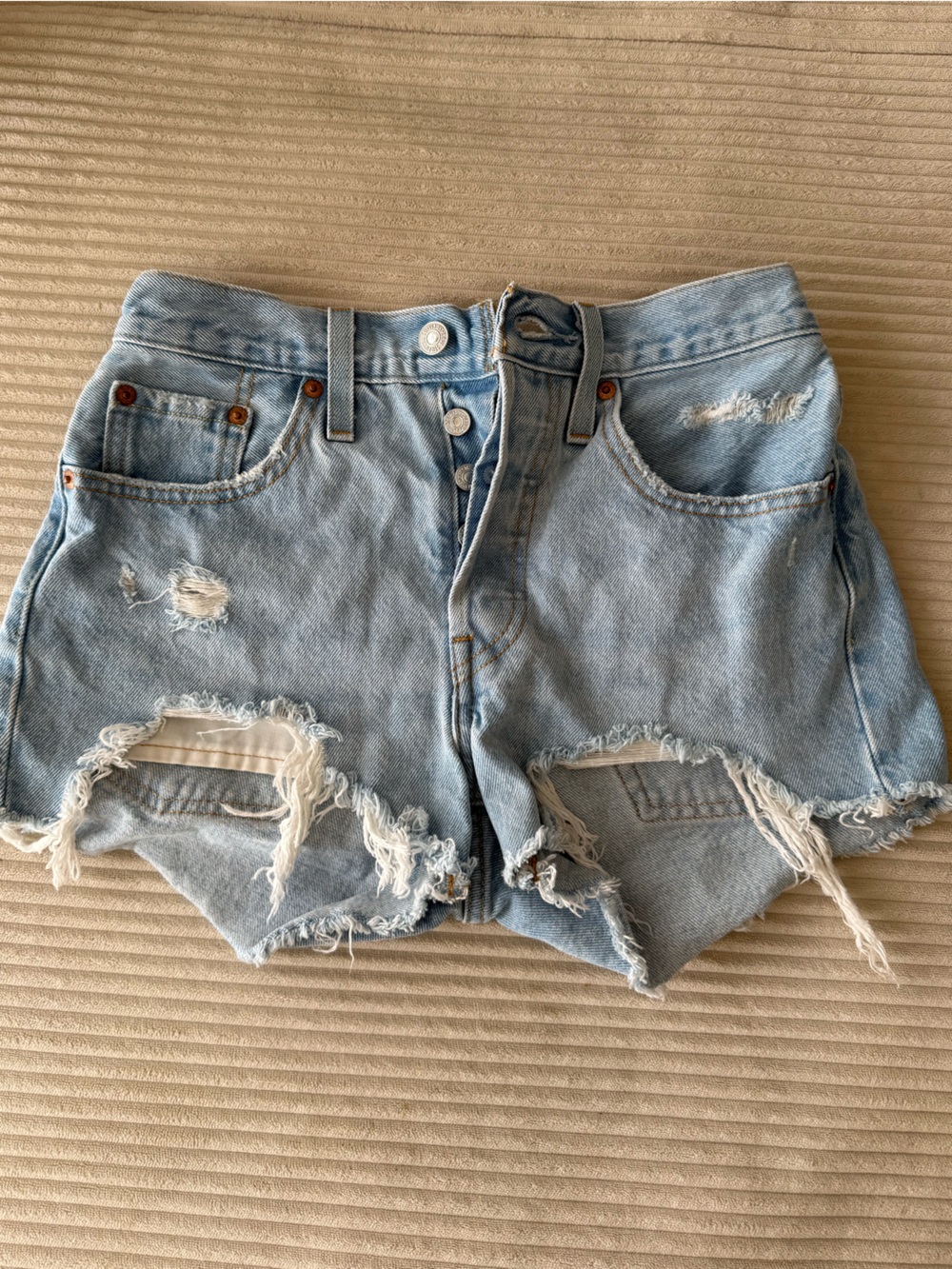Levi's Light Blue Distressed Denim Shorts